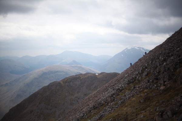People taking the highly unpleasant and unwise 900m scree descent from Sgorr nam Fiannaidh to the road