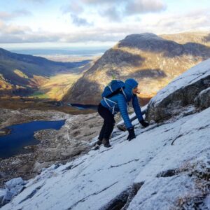 Four friends on a wintery Bristly Ridge on Glyder Fach